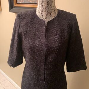 Elegance Tahari mid length design with three quarter sleeves